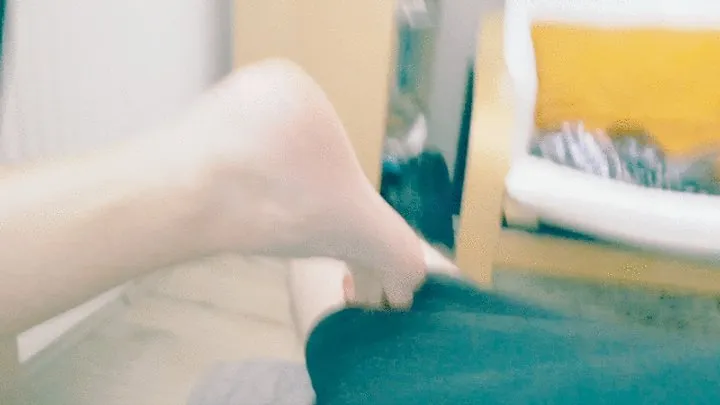 Quick footjob during conversation