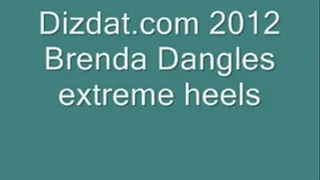 Brenda dangles Extreme Arch Heels