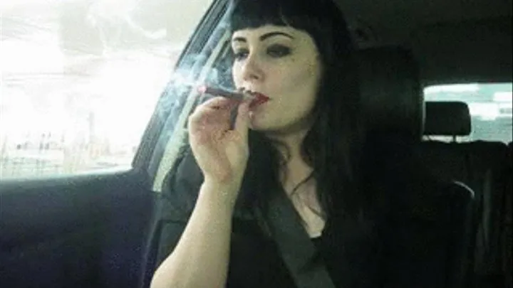 smoking a cigar in the car