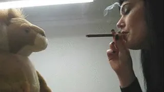 practicing smoky kisses on a teddy bear