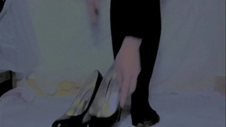 smushing bananas in black pumps