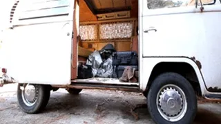 Damara Hanging Out by the VW Bus in Long Leather Coat & Tall Boots