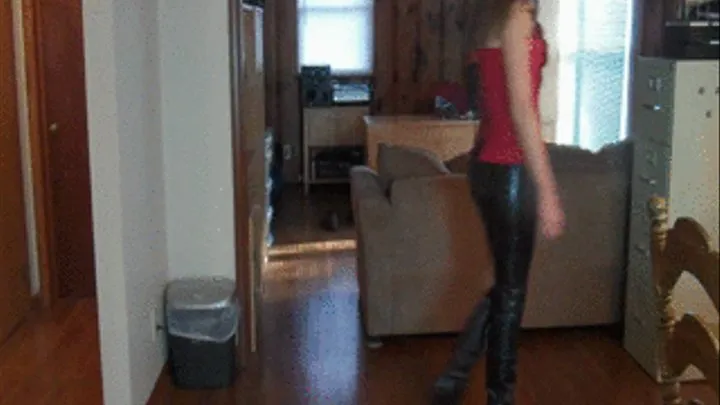 Elizabeth Wearing a Red Corset, Leather Pants & Knee High Boots