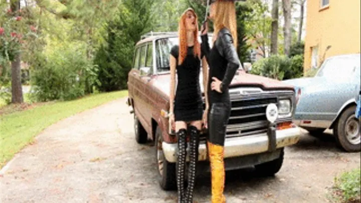 Cassandra & Crystal Wait in the Rain in Boots & Leather While Crystal Smokes