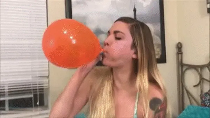 Ayla loves blowing up balloons!