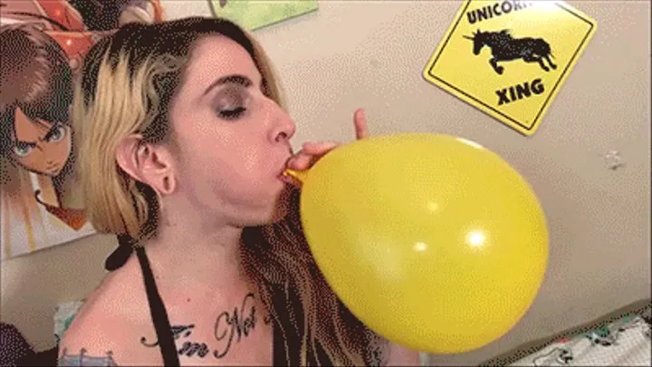 Sheena Rose blows up balloons