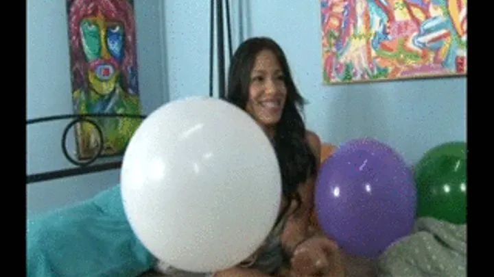 Brat looner Veronica Heelz chats up while playing with balloons in bed (NO POP) IPHONE File