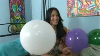 Brat looner Veronica Heelz chats up while playing with balloons in bed (NO POP) File