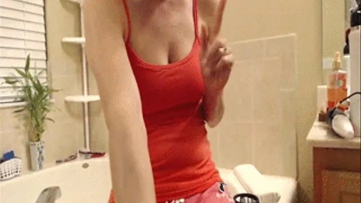 Webcam girl shaves legs and masturbates in bathtub
