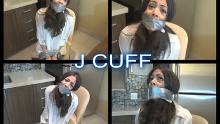 Jasmine McAdams chair taped and wrap-around-the-head tape gagged