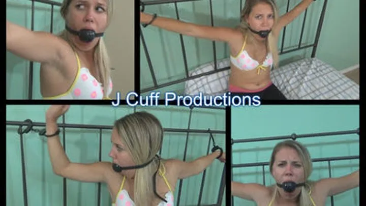 Samantha Thomas: Bed cuffed and cleave gagged (Cuff key challenge #2)