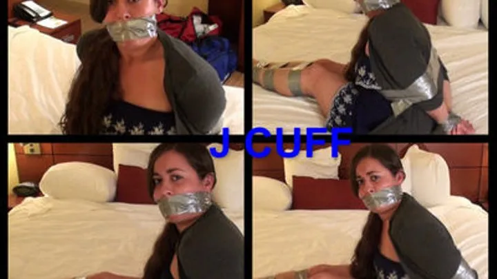 Whit tightly taped and double gagged