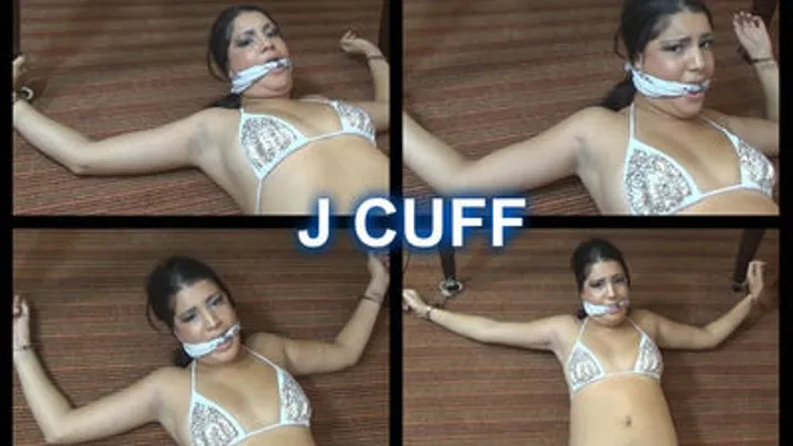 Jasmine table cuffed, ankle cuffed and cleave gagged (knotted)