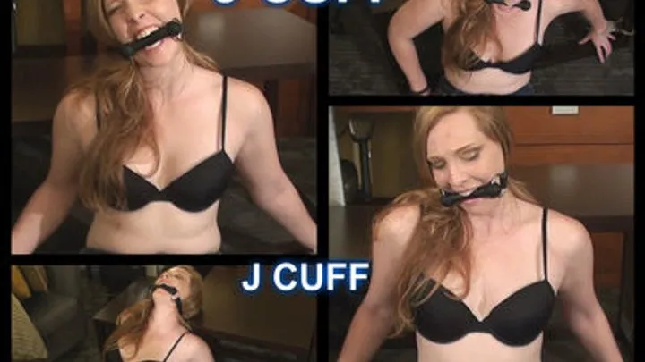 Ivey table cuffed and bit gagged