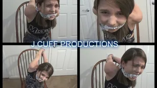 Celeste Hill: Zip tied and cleave gagged (Double-arm chicken wing)