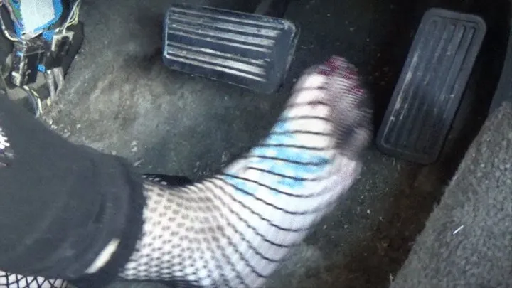 Driving in black fishnets 121