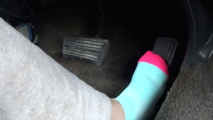 driving in my blue and pink toed socks 221