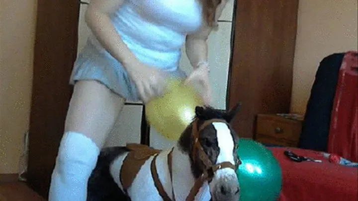 Popping balloons with ass riding horse