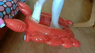 Deflating crab with bare feet