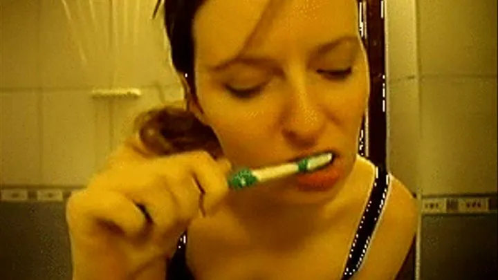 Woman Brushing her Teeth