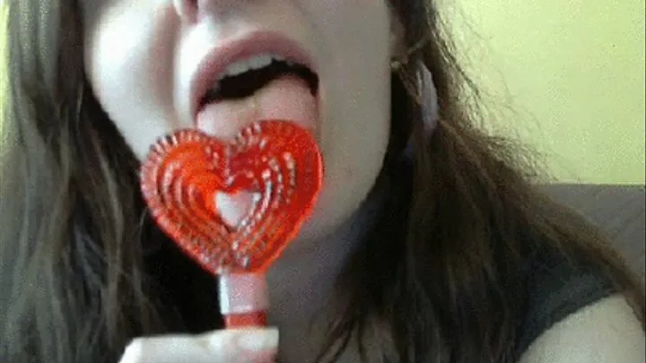 Licking heart lollipop