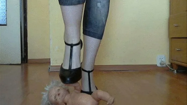 Doll crushed under high heels