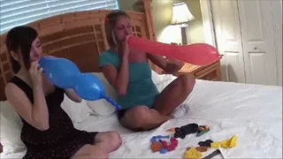 Kristen and Tay blow up and pop balloons