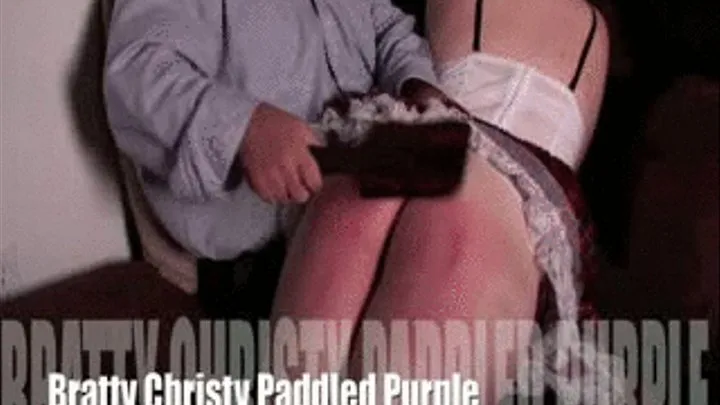 Christy Paddled Purple over the Principals Lap