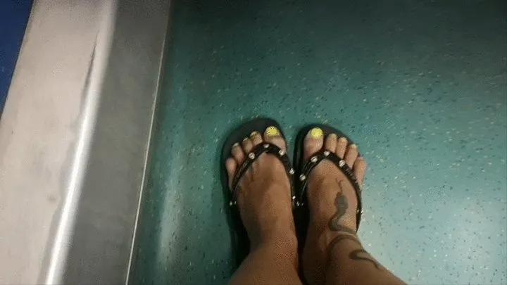 Playing by train with my versace flip flops