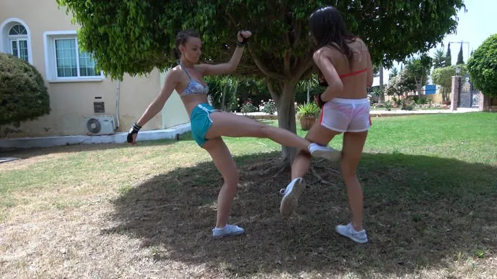 Belly punching outdoors - Renee vs Sabrina