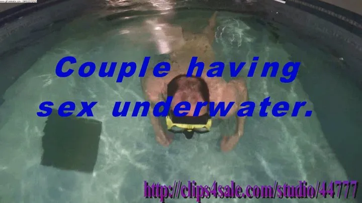 Couple having sex underwater.