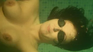 Swimming and posing underwater