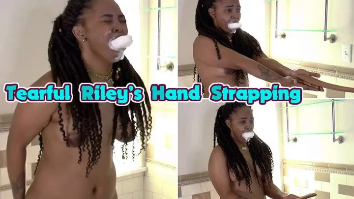 Tearful Riley's Hand Strapping