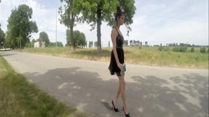 Wetting the road in dress and high heels!