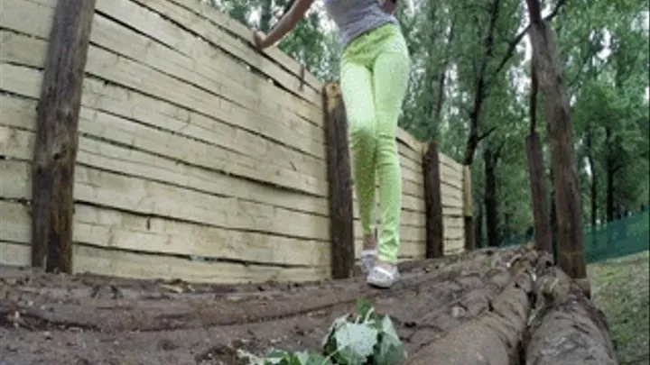 Wetting her jeans on a bridge