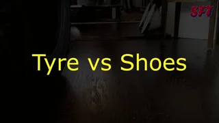 Playing with shoes and a tyre without rim