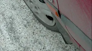 Flat front tyre on car