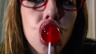 Secretary sucking on lollipop