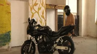 Strapon fuck on motorbike