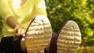 Smelly feet in sneakers outdoors