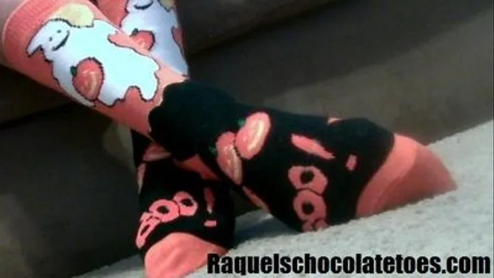 Raquels Chocolatetoes wiggling her toes in some Halloween Socks