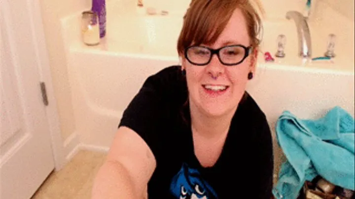 Fucking a suction cup dildo in the bath