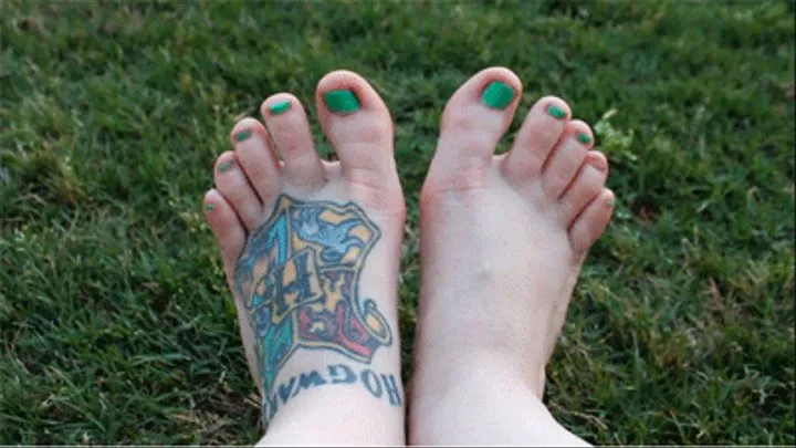 my adorable feet in the grass