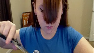Hair cutting. Trimming my bangs and split ends.
