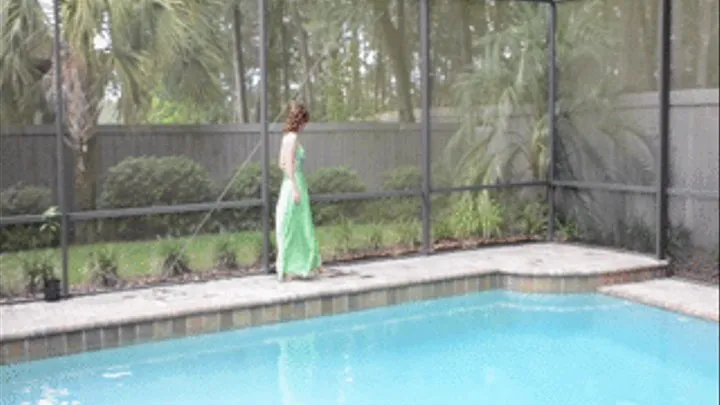 Jade swims in a green gown