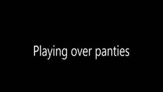 Playing over panties