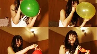 Pretty Young Woman Playfully Blows Balloons - YUD-038