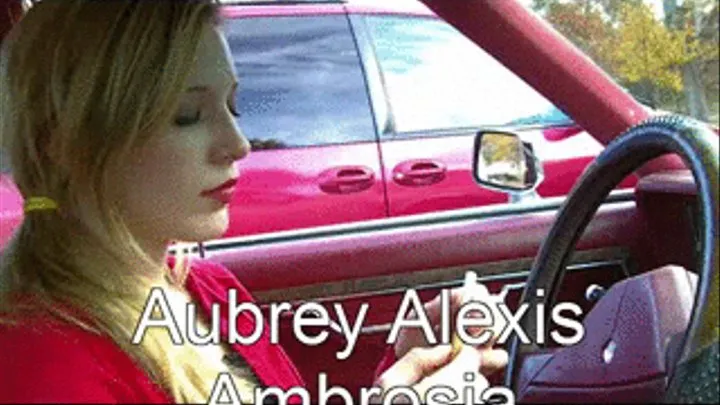 Aubrey smoking iand driving in bright lipstick!!