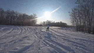 stuck in the snow in an orange car a