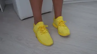 Wiggling my toes in my soft yellow sneakers a